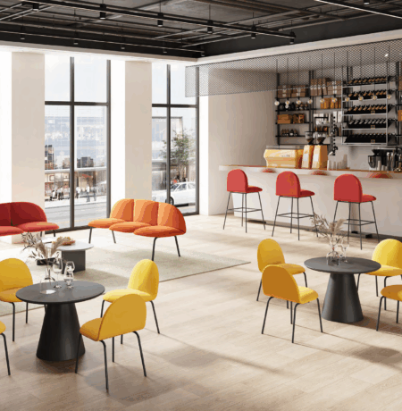 A procurement manager reviewing ISO certification documents for office furniture