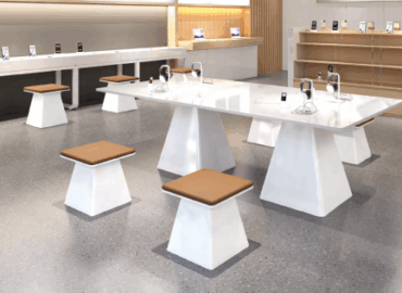Collaborative breakout zone with soft seating and coffee tables