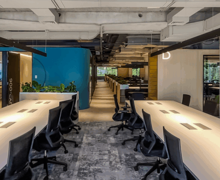 Large scale warehouse showing bulk office furniture supply for international shipping