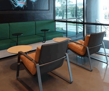 Modern coworking space with modular workstations and ergonomic chairs in a 2026 layout
