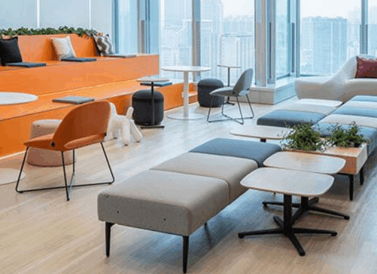 Modern office furniture showroom featuring private label ergonomic chairs and modular desks