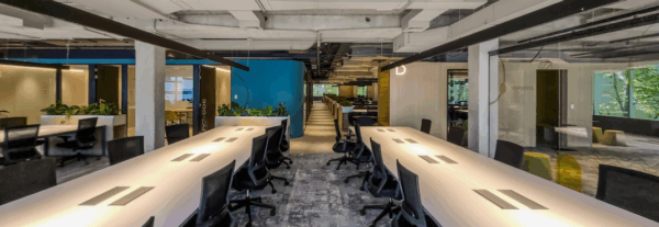 A collection of high-end executive boardroom tables and luxury credenzas