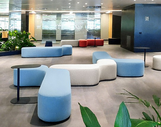 A variety of beam seating and lounge chairs in a professional waiting room