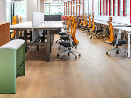 Modern factory floor producing high-end executive ergonomic chairs