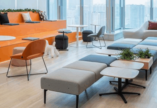 Modern ergonomic office furniture display in a global showroom